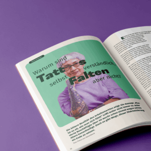 A double page spread of a magazine depicting a hip looking older lady with tattoos and the headline "Why are tattoos fine but wrinkles aren't?"